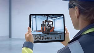 A worker using an augmented-reality app on a tablet